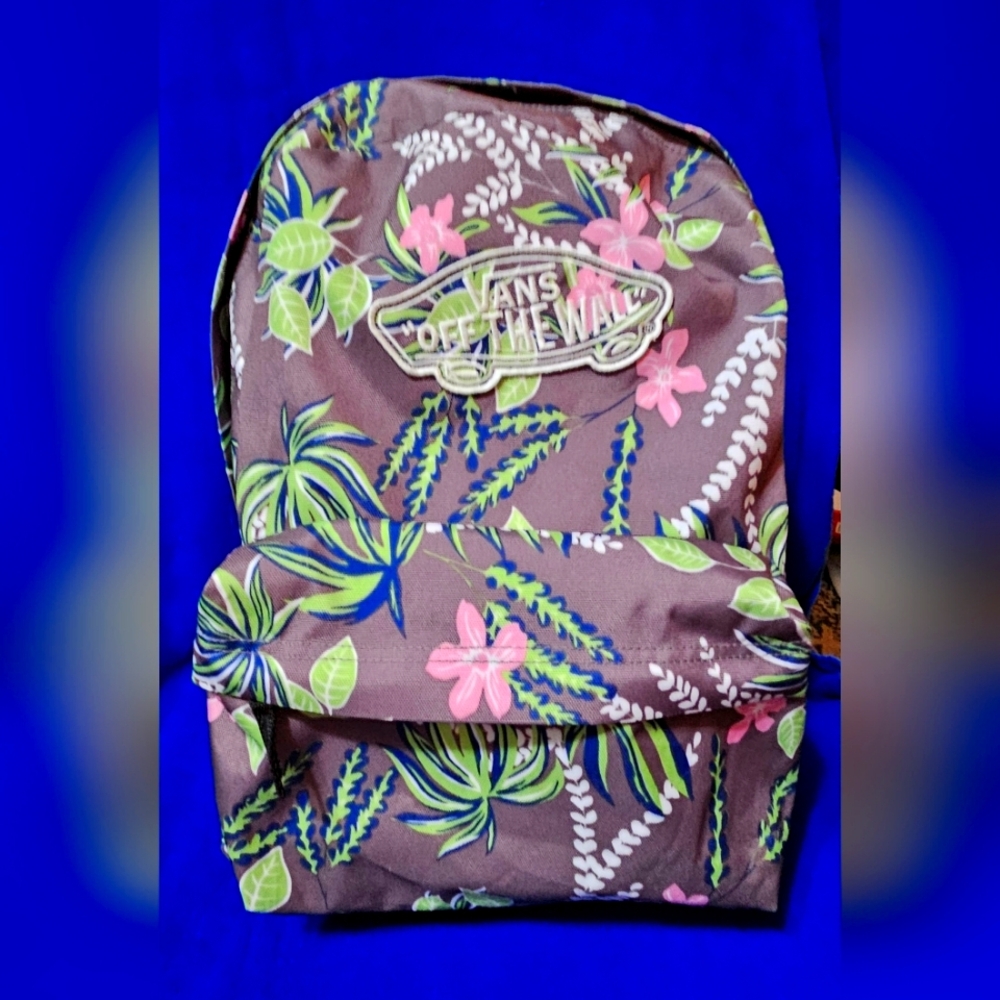 Vans off the wall gray floral backpack with back padding for comfort. Full size